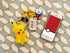 Figurine lumineuse Pokémon Pikachu assis avec dragonne