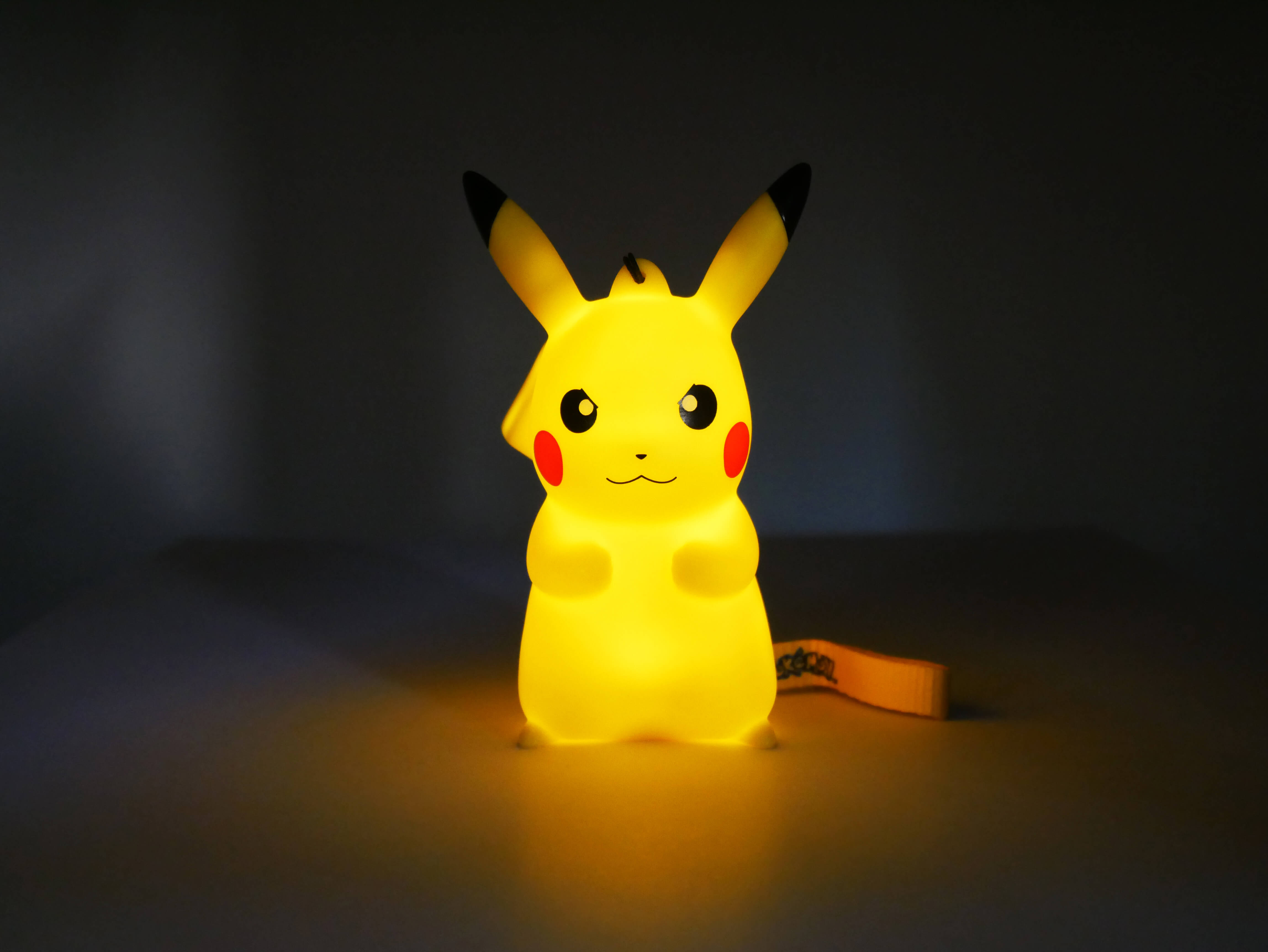 Light-Up Figurine Pokémon Pikachu Grumpy with handstrap