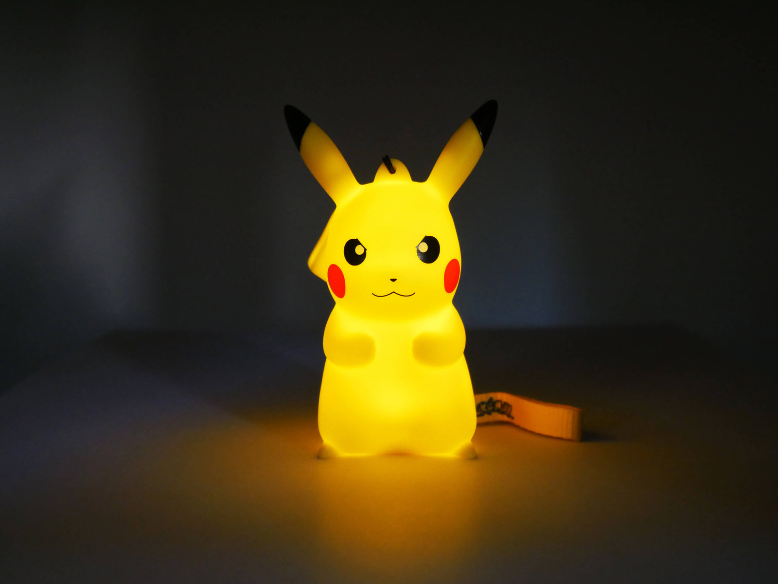 Light-Up Figurine Pokémon Pikachu Grumpy with handstrap