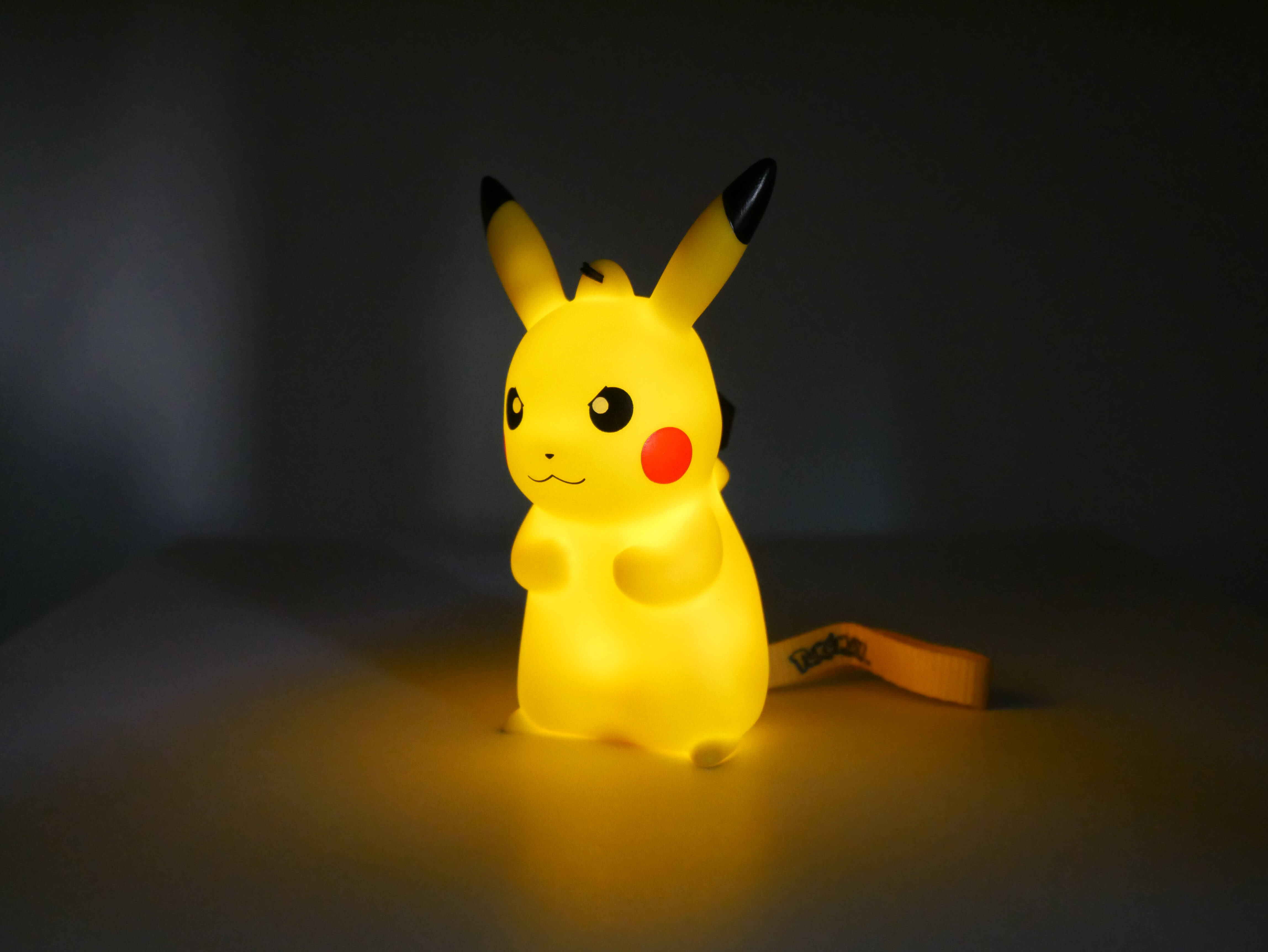 Light-Up Figurine Pokémon Pikachu Grumpy with handstrap