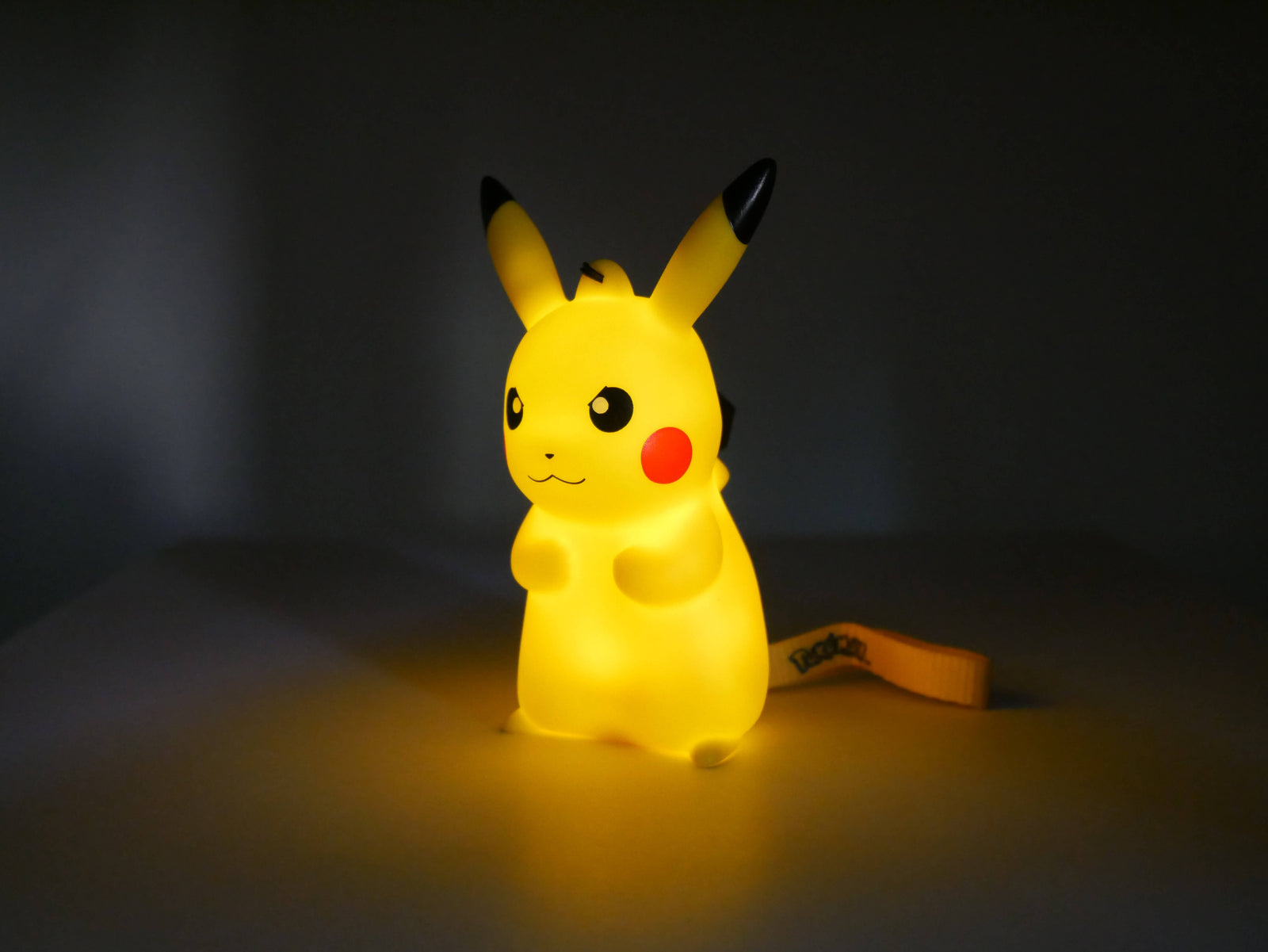 Light-Up Figurine Pokémon Pikachu Grumpy with handstrap