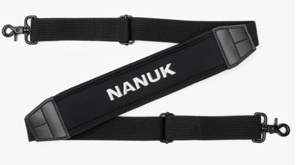 Black Nanuk shoulder strap on a white background