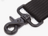 Close-up of black metal swivel clip attached to a black webbing strap, set against a white background.