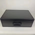 Closed Black Miniature Storage Case box with a handle on a white background