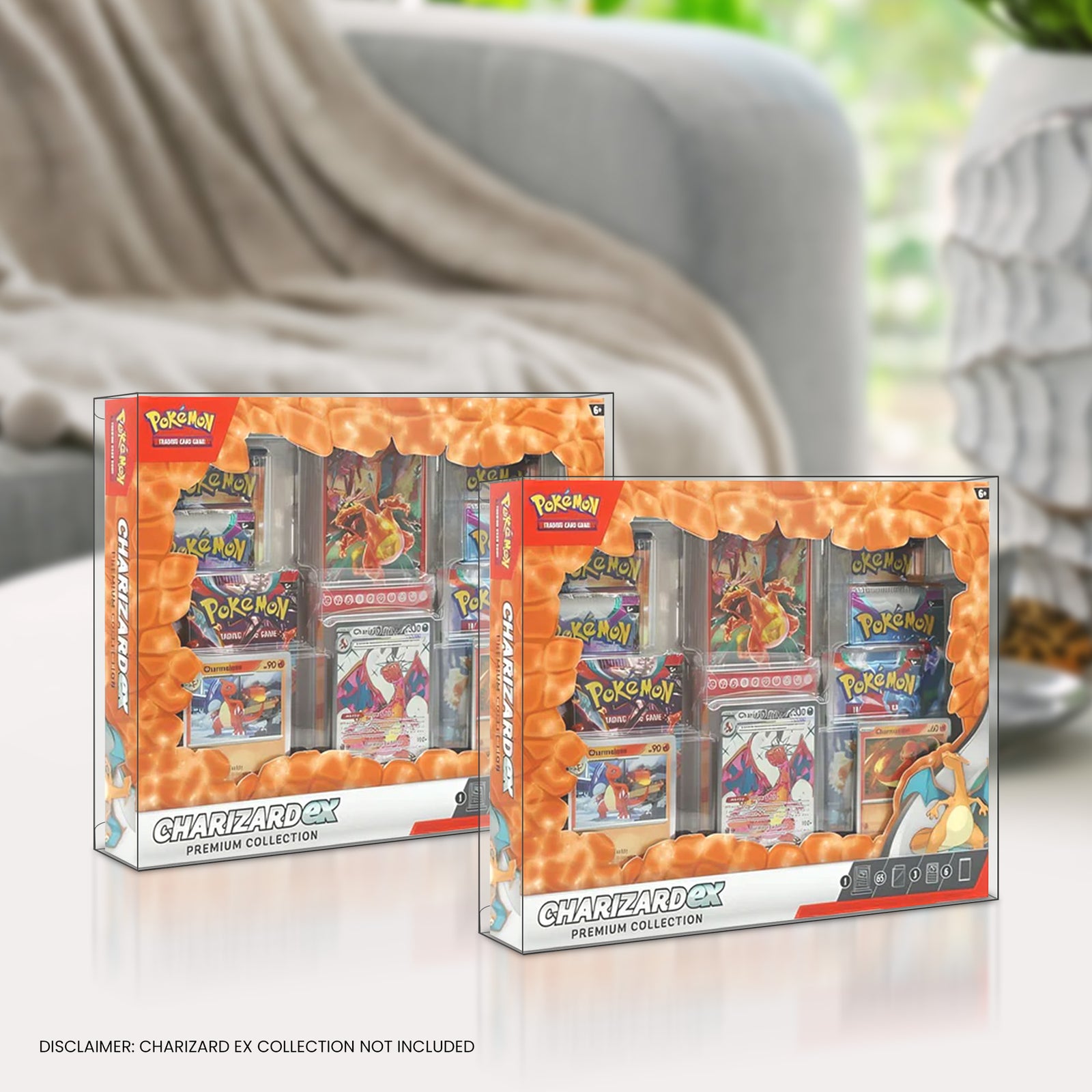 Two boxes of Charizard EX Premium Collection inside the PET protector in a living room setting.