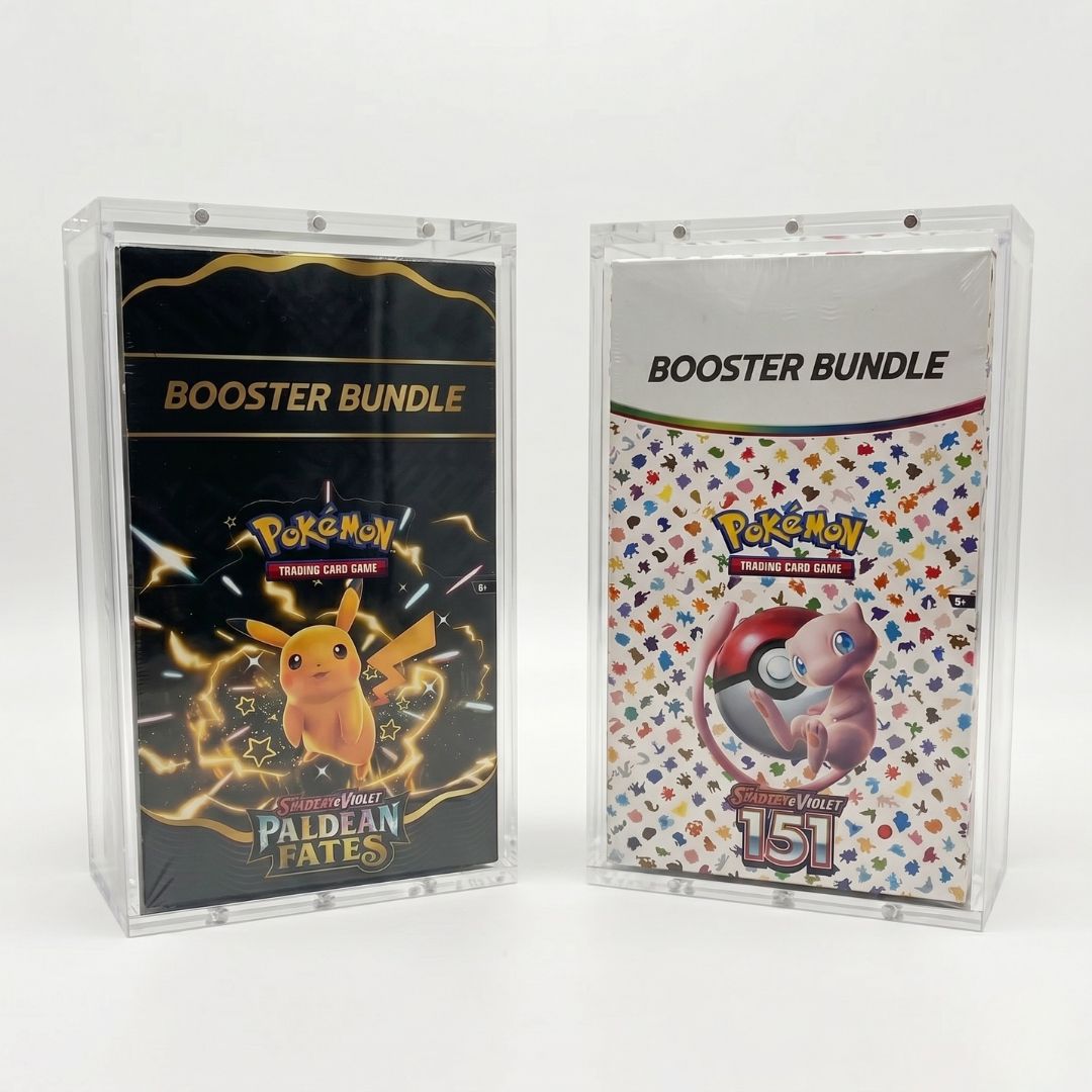 Two Pokemon trading card game booster bundles in clear packaging on a white background
