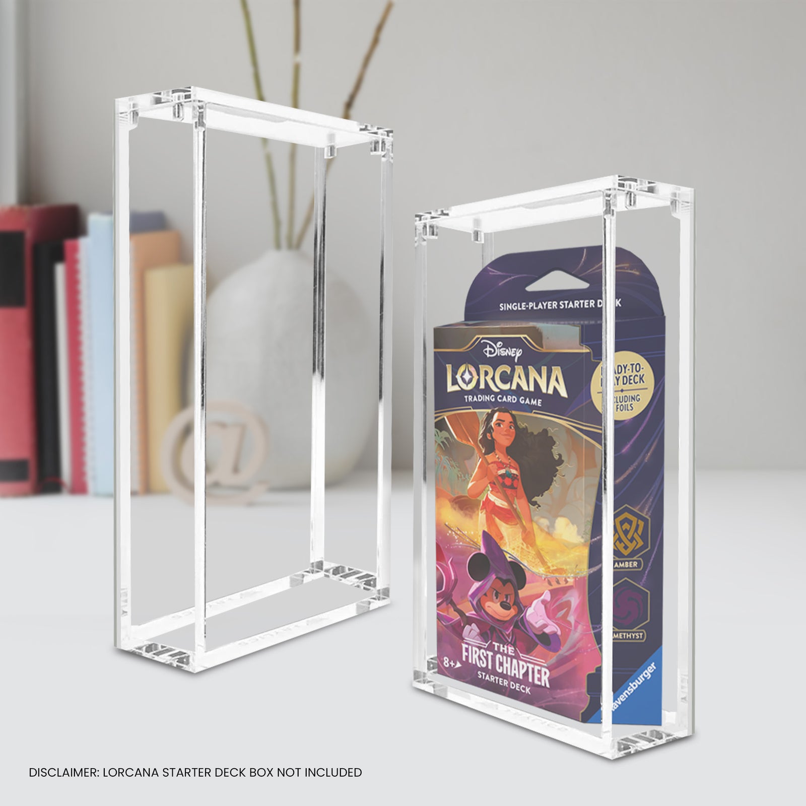 Clear acrylic display case with a Disney Lorcana trading card game box inside, on a neutral background.