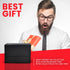 Bearded man with glasses reacting to gift box labeled BEST GIFT, magnetic card holder shown in lower left corner