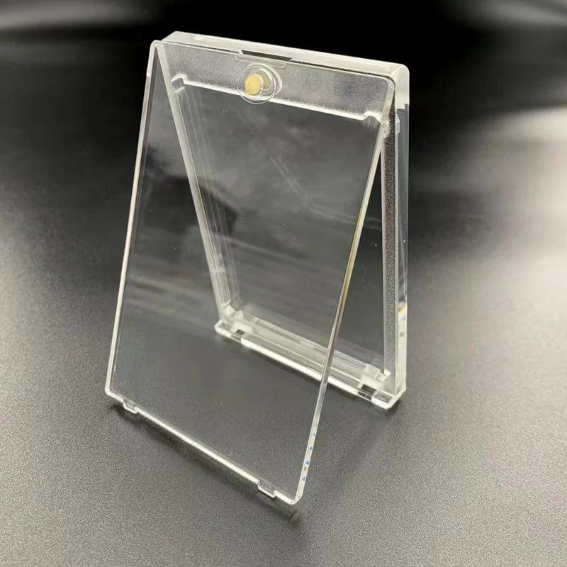Open magnetic one touch card holder showing clear case design for trading cards
