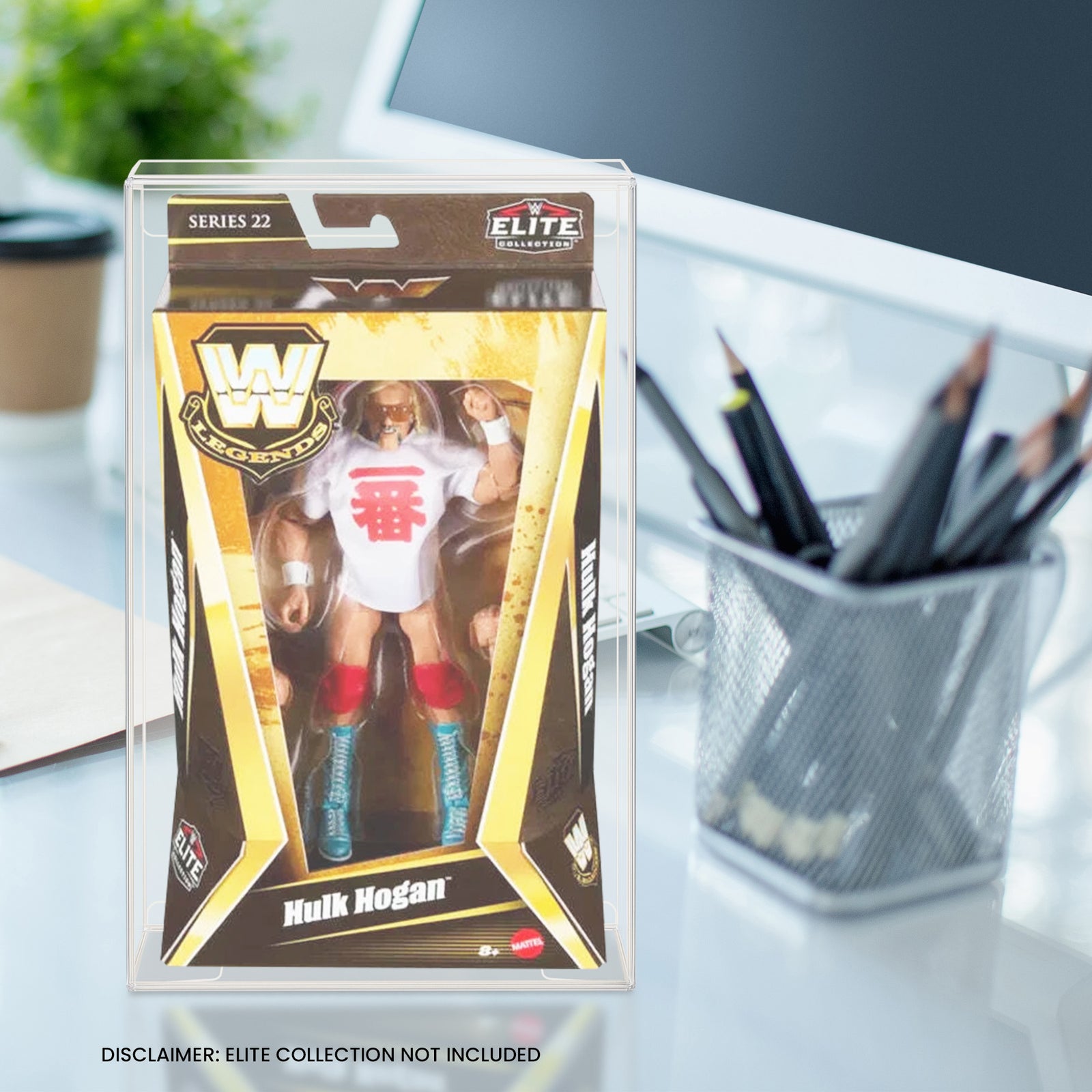 WWE Legends Hulk Hogan figure inside PET protector on a table, beside a square pencil holder with upright pencils.