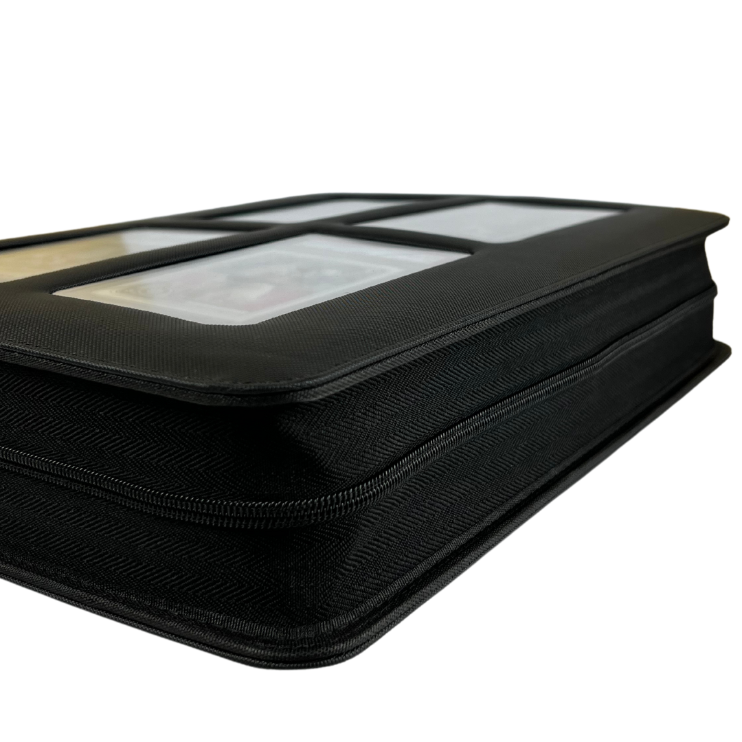 Close-up side view of a closed slab binder showing textured black material and zippered edge